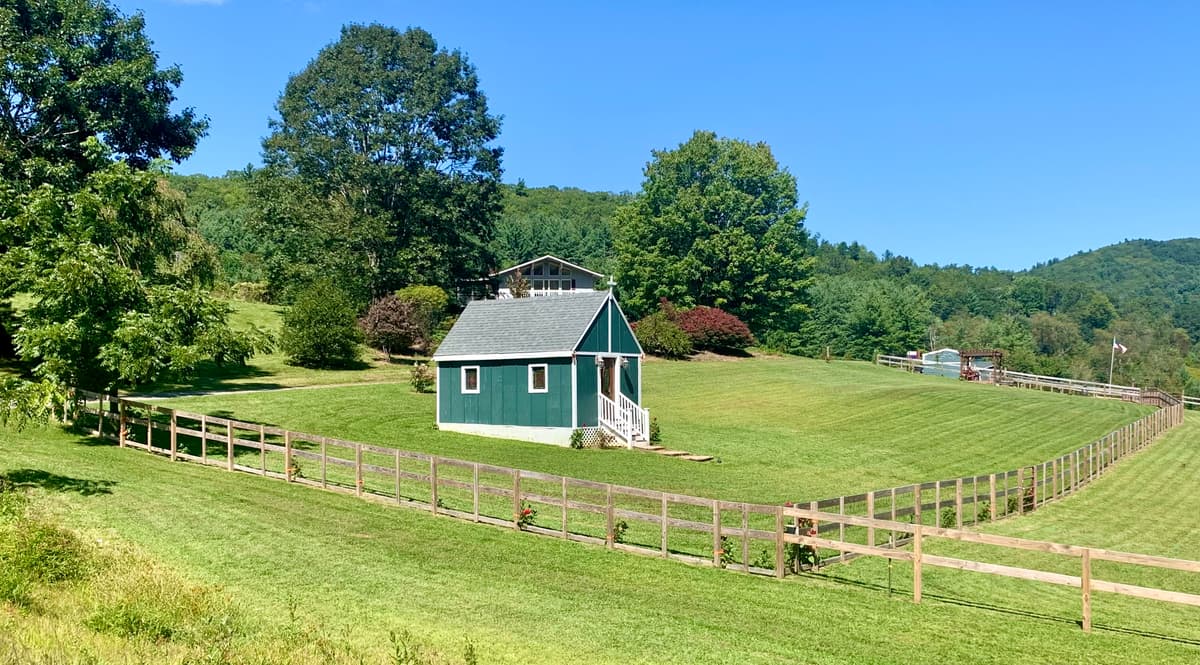 Chapel in summer landscape